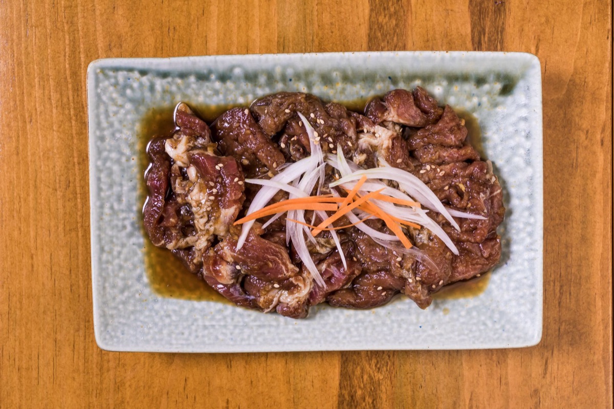 Korean street food stall with bulgogi